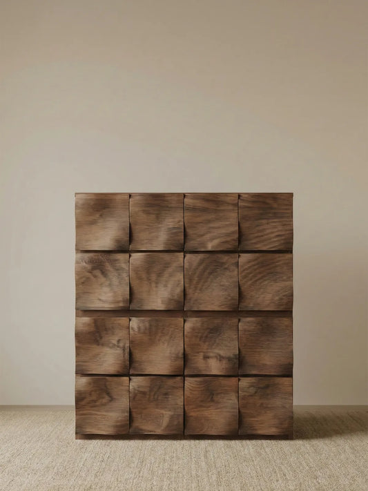 Full front view of the Walnutry Cumberland 4-row chest, showcasing the continuous flow of the wave pattern across solid walnut drawers.