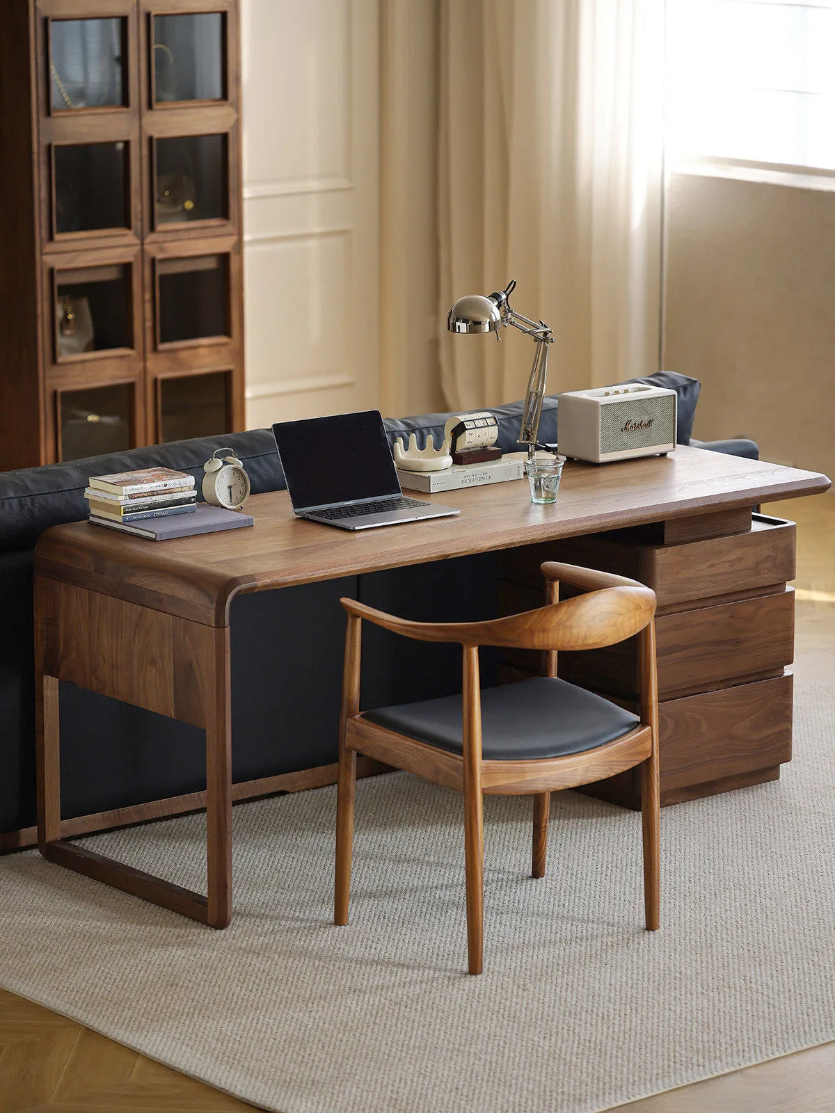 Walnutry Marlow walnut office desk with three-drawer storage in a styled living workspace