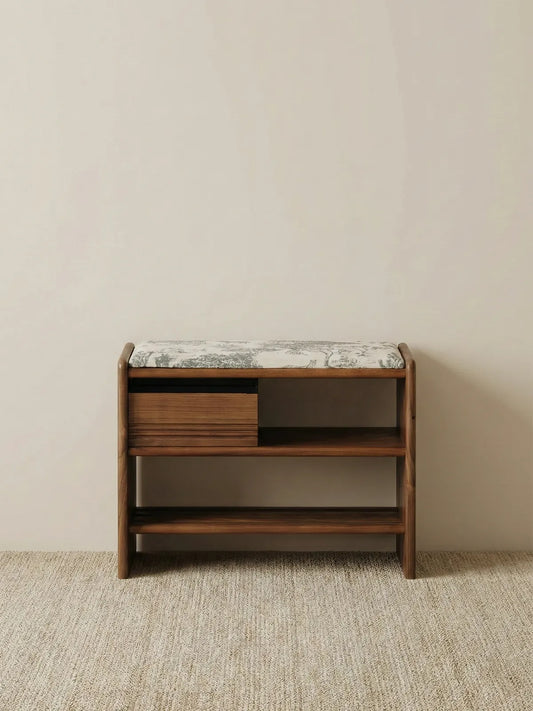 Walnutry solid North American black walnut entryway bench featuring a built-in shoe storage shelf, a wooden drawer, and a patterned upholstered seat cushion.