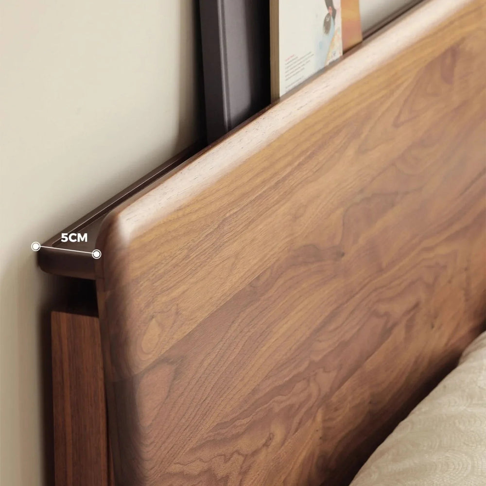 Close-up of solid North American Black Walnut headboard with natural oil finish showing 5cm thickness