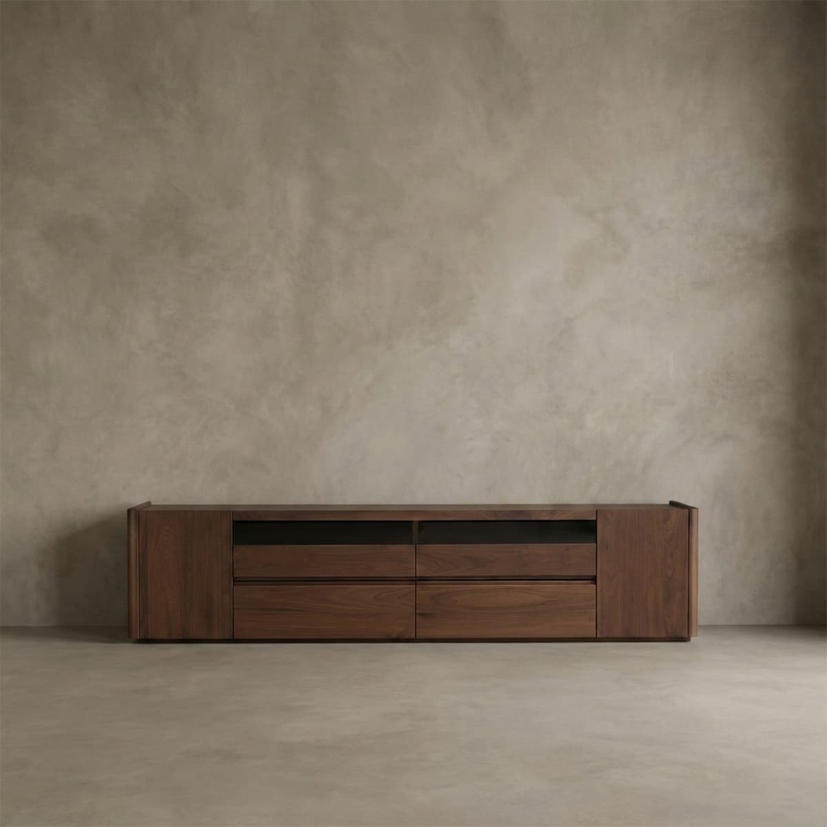 Solid North American Black Walnut low media console with drawers and cabinets against neutral textured wall