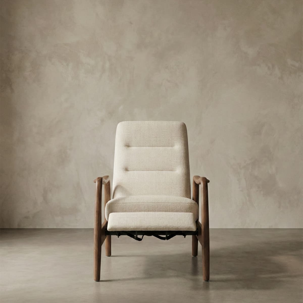 Modern lounge chair with beige fabric upholstery and solid walnut wood frame against neutral wall