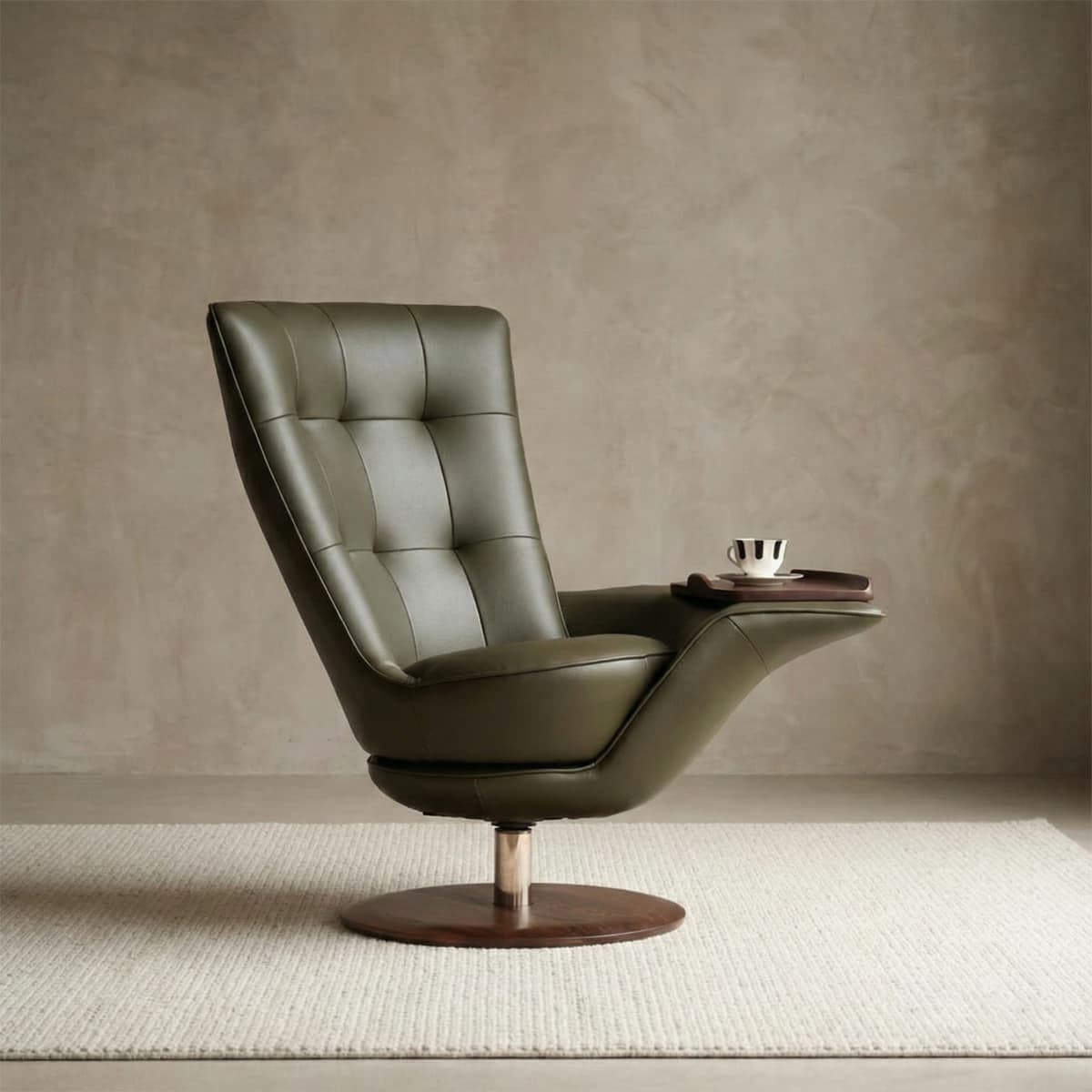 Modern olive green leather swivel chair with tufted backrest and integrated wooden side table holding cup and saucer on beige rug