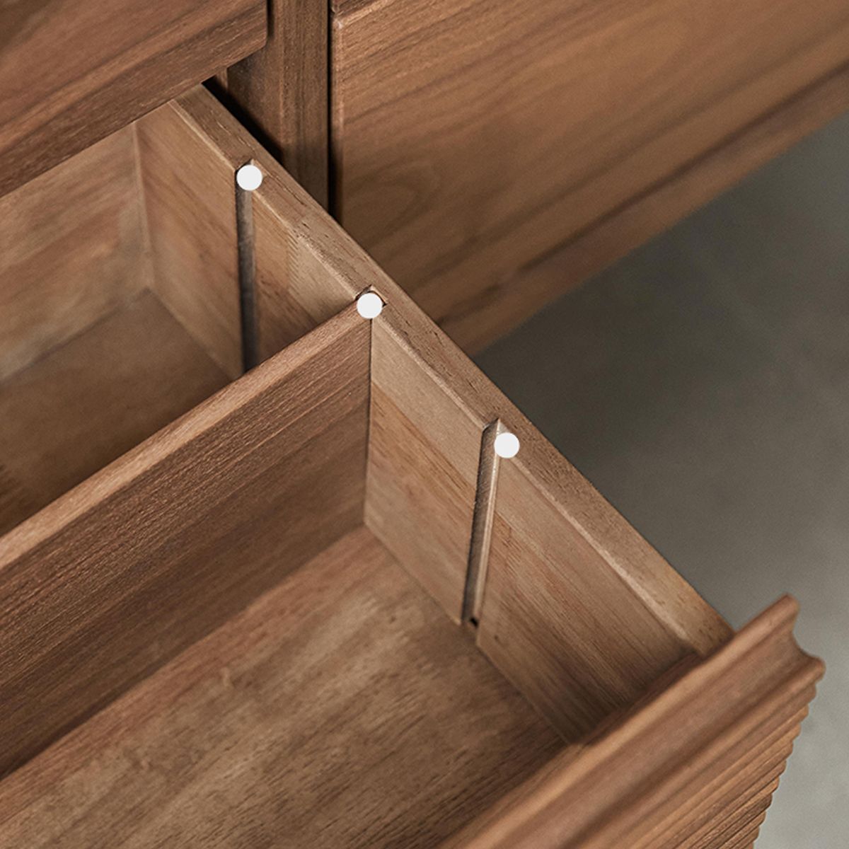 Close-up of a 3D textured wooden drawer detail showcasing natural grain and smooth finish