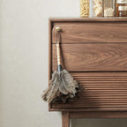Close-up detail of the raised square grid pattern on the solid wood dresser drawers.
