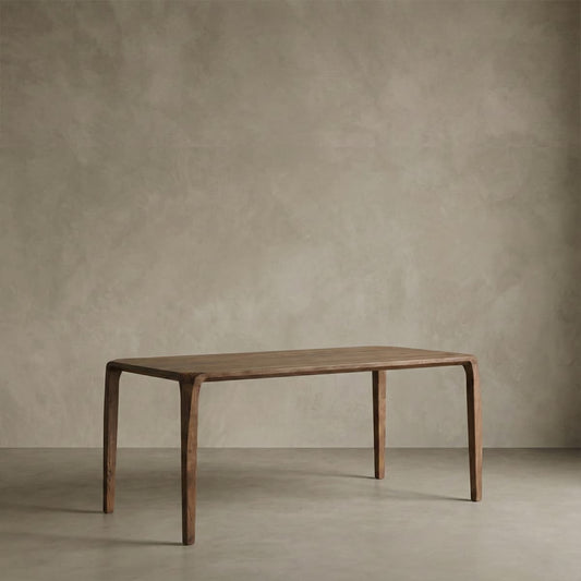 Minimalist solid North American black walnut dining table with natural oil finish in neutral room