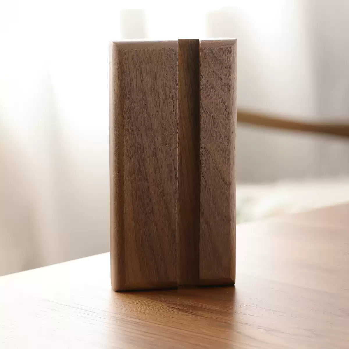 Heirloom-quality solid North American black walnut wooden block with natural oil finish on table
