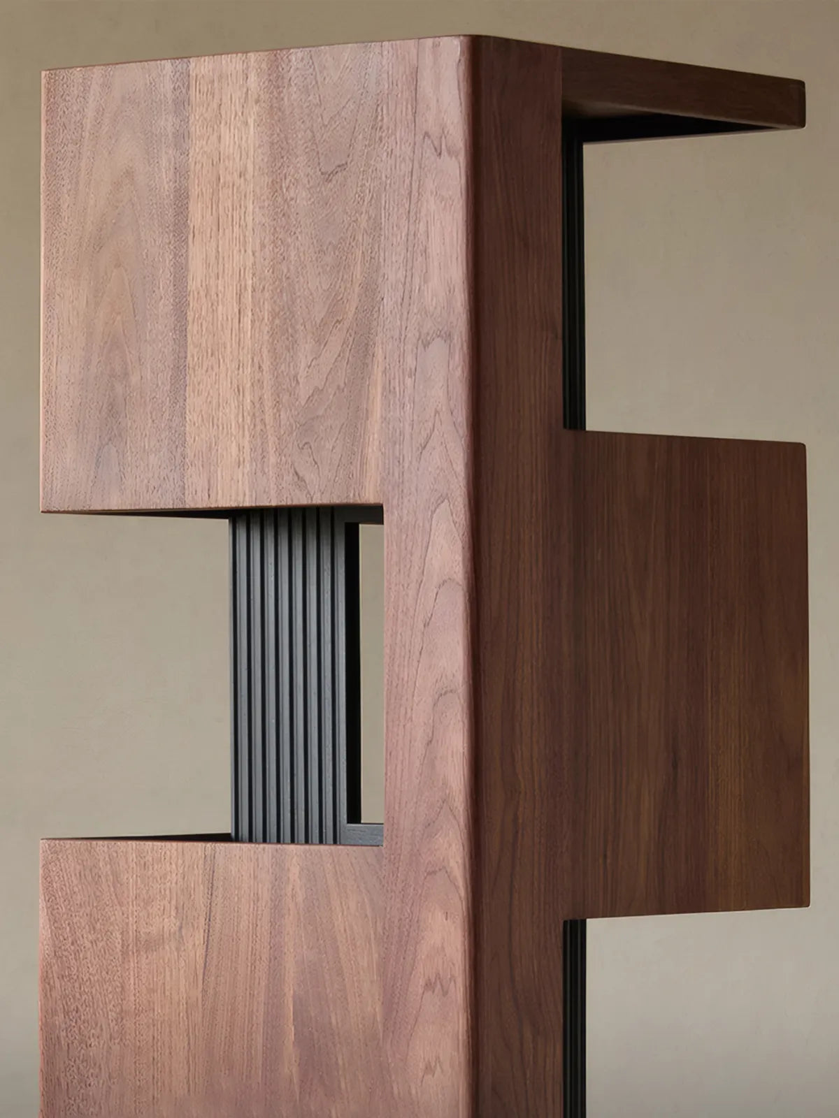Detail shot of the vertical walnut slats and negative space design on the Suiseki revolving tower.