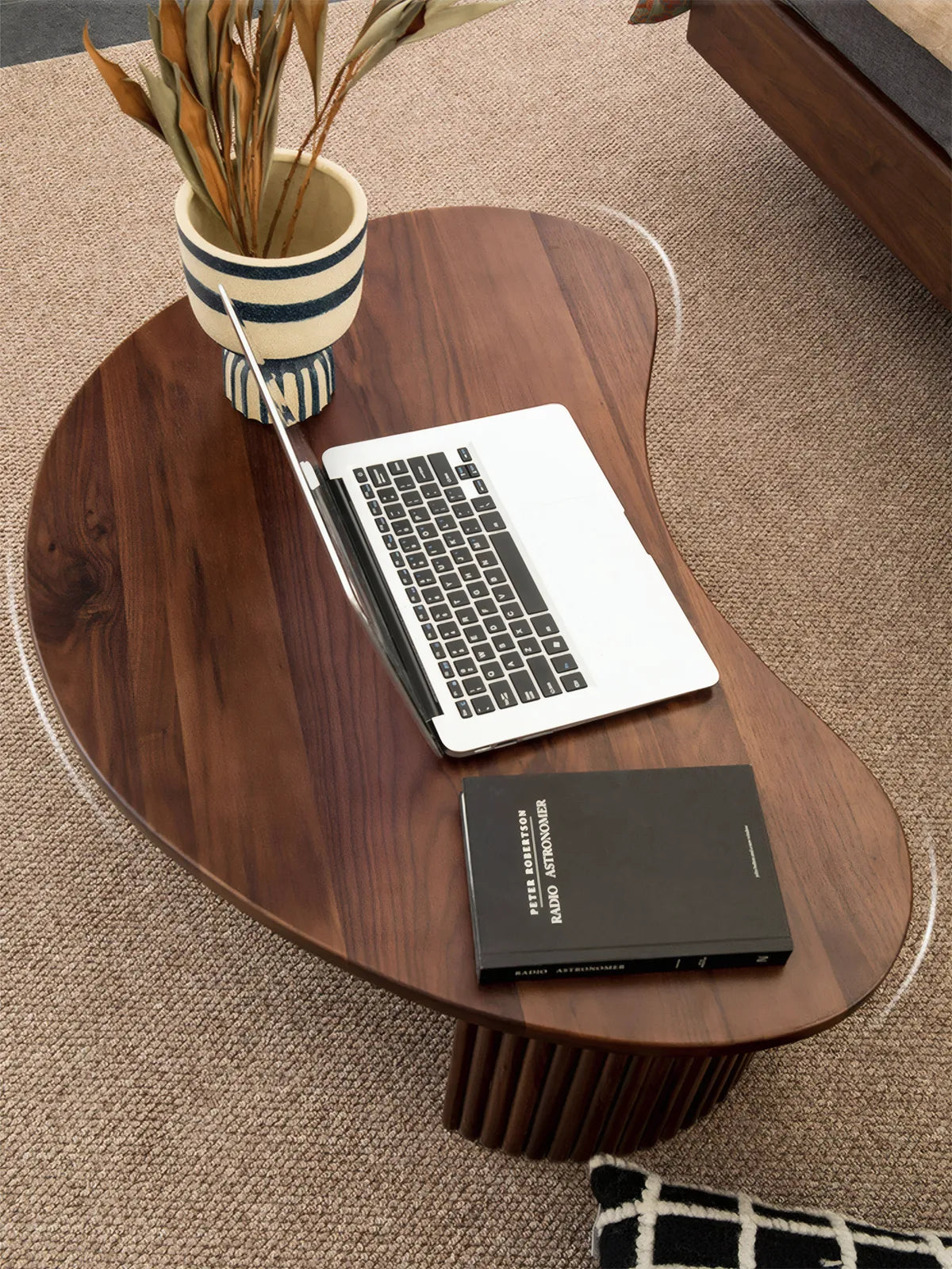 "Close up of FAS grade North American Black Walnut wood grain on the Kurumi organic coffee table surface."