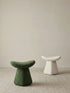 Comparison of the Cumberland mushroom stool in Moss Green and Cream White bouclé, highlighting color options for different interior styles.