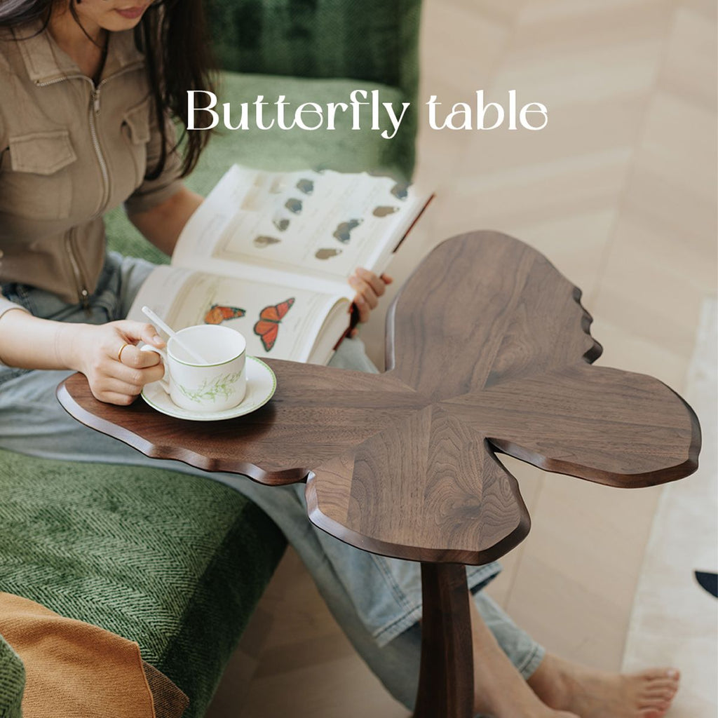 Top view of the Walnutry Papillon accent table showcasing its unique organic butterfly wing shape.