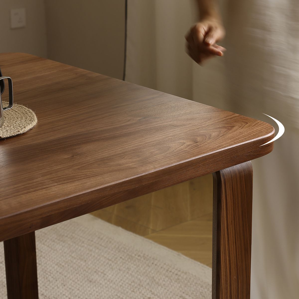 Walnutry solid walnut dining table corner with smooth rounded edges and elegant wood grain finish