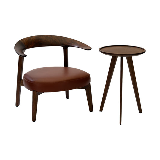 Modern wooden armchair with curved backrest and leather seat next to a round wooden side table