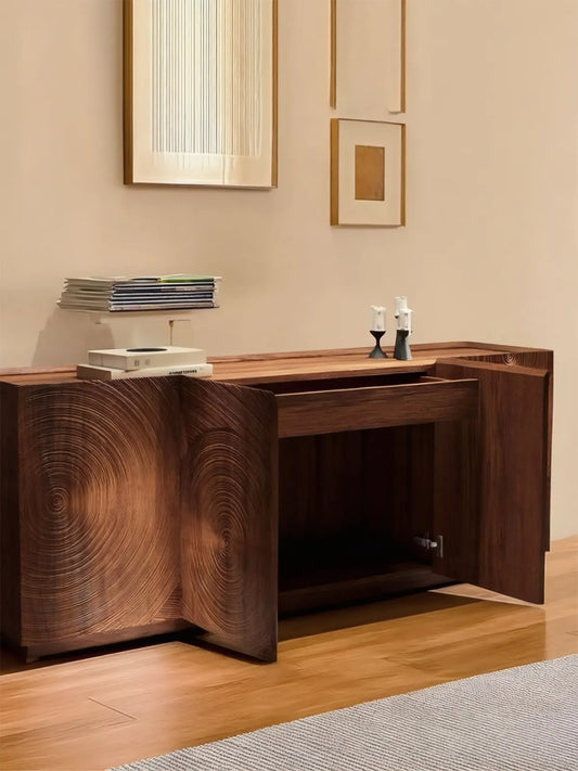 Side view of the Curator solid wood media console featuring an open top drawer, showcasing the sturdy construction and rich wood finish.