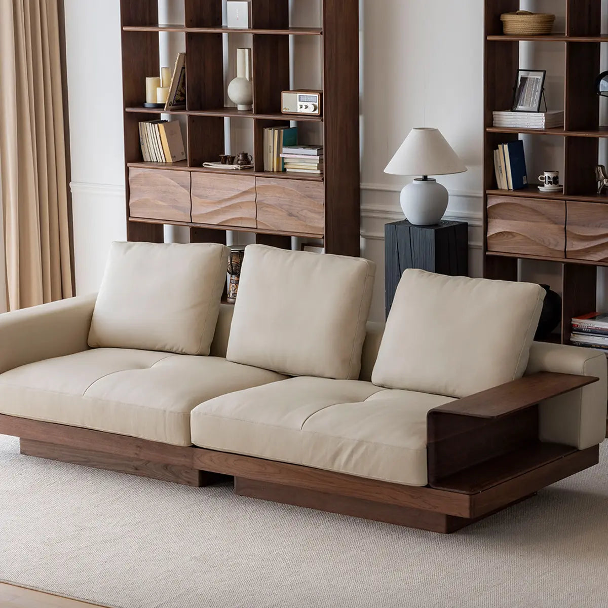 Side profile of the Komorebi sofa highlighting the floating wood base and deep seating depth.
