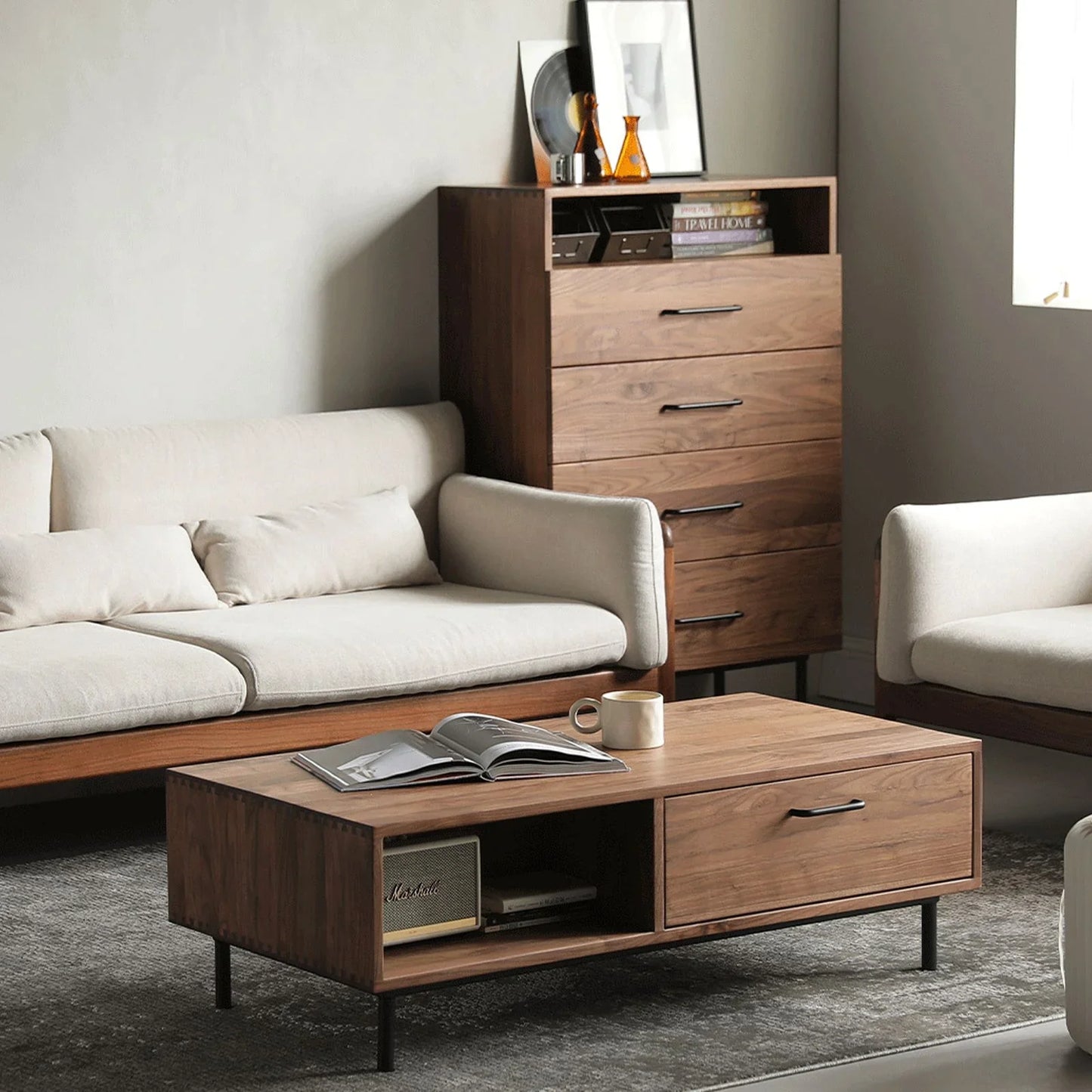 Modern living room featuring a premium solid wood coffee table with a large storage drawer in side view.