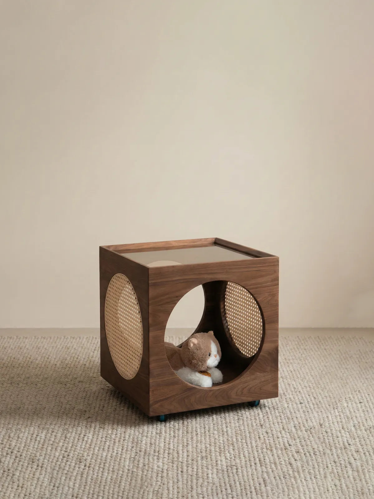 Minimalist studio shot of the Walnutry Sylvan cat side table on a neutral background