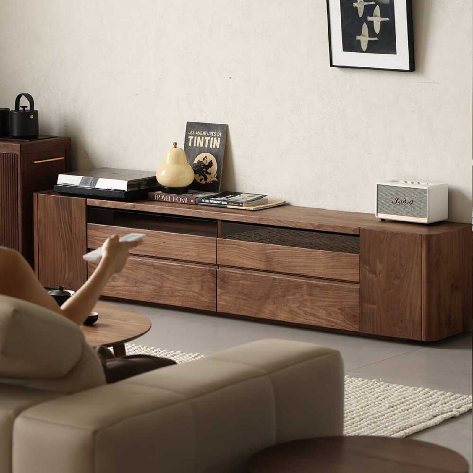 Natural sunlight hitting the surface of the FAS black walnut console, showing the warm, rich tones of the oil finish.