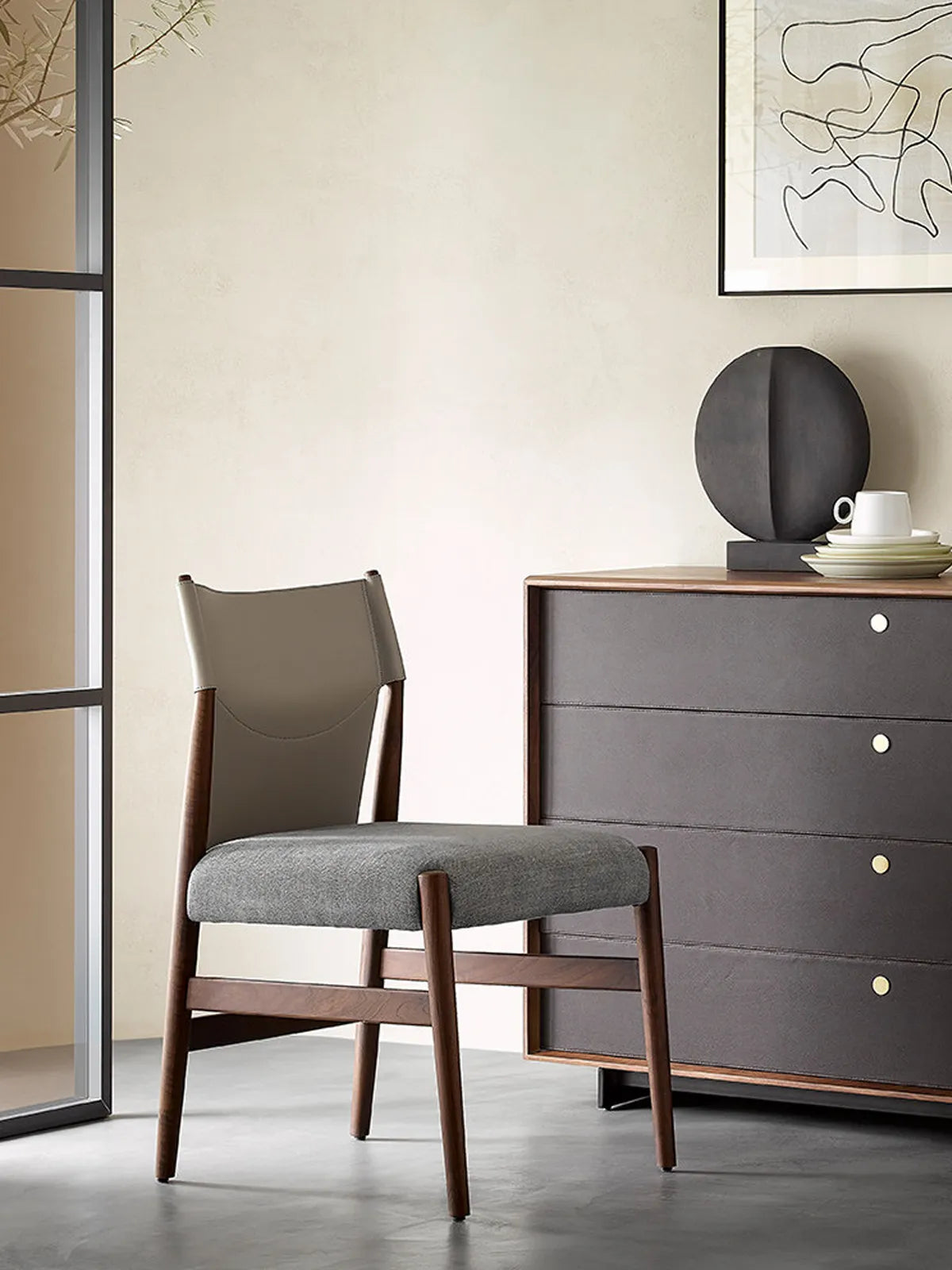 Side profile of the Opus mid-century modern walnut chair showing the sleek wooden frame structure and lumbar support angle.