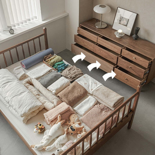 Walnutry Grid 8-drawer solid black walnut dresser with unique 3D waffle textured drawer in a bedroom.