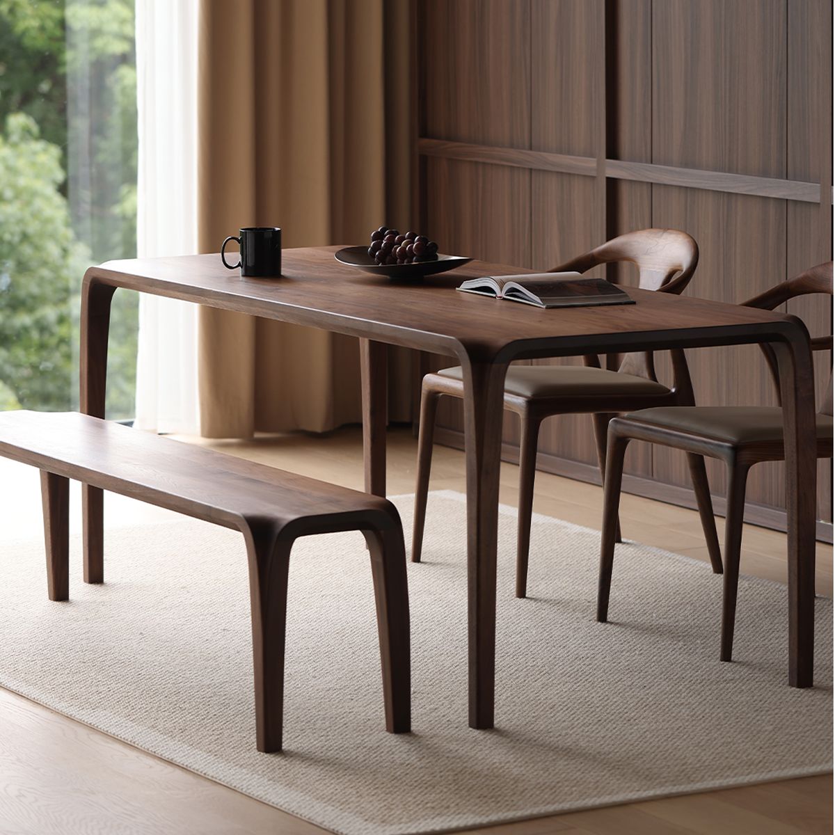 WALNUTRY WOOD solid walnut dining table with matching bench and chairs in modern dining room