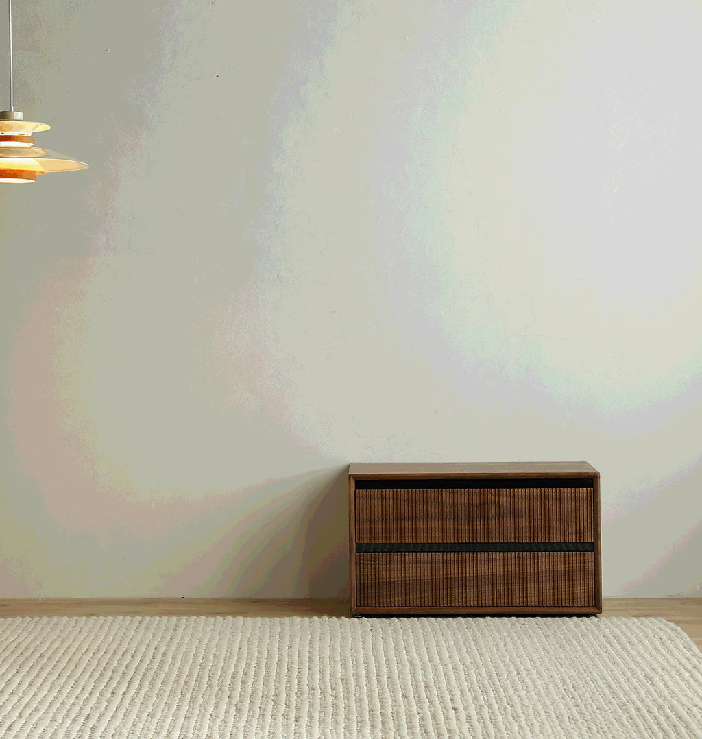 Walnutry Composer modular solid walnut storage system featuring vintage glass sliding doors.