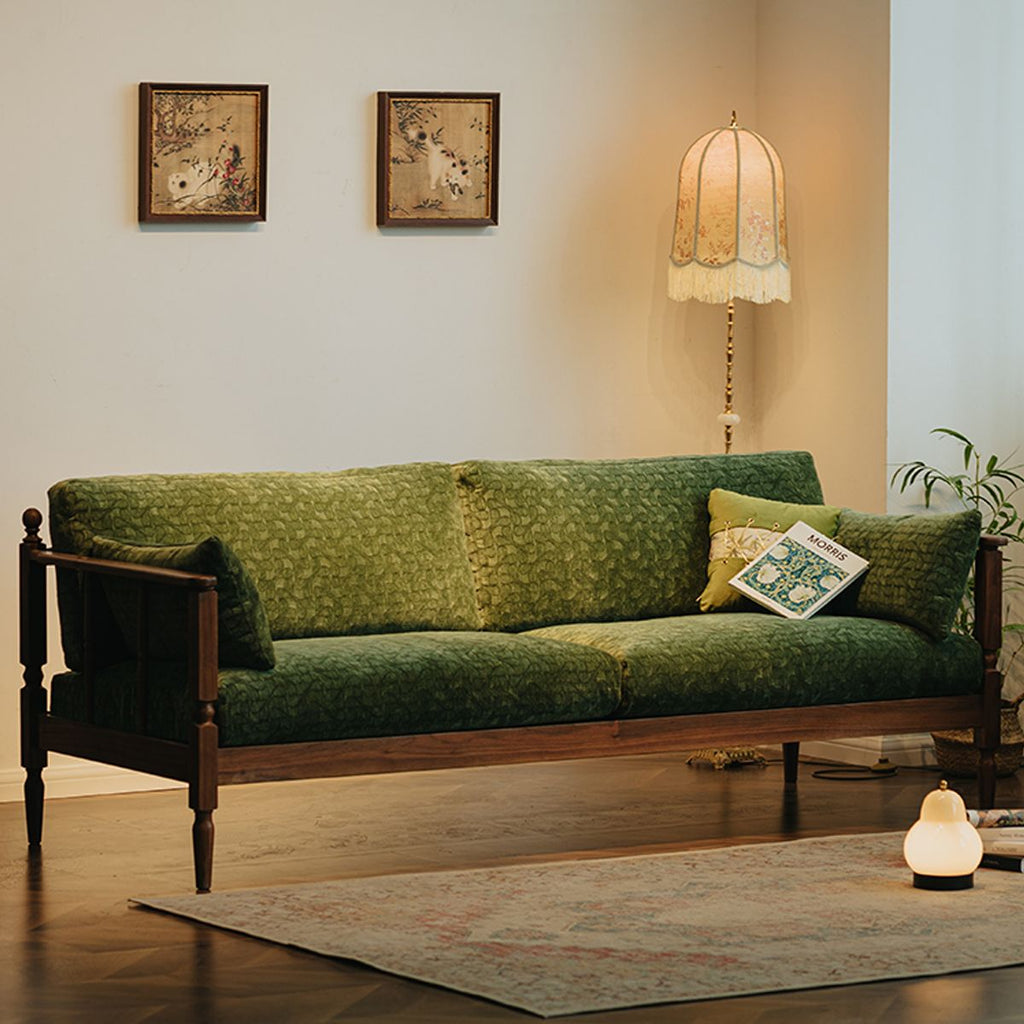 Walnutry Morris solid black walnut sofa with roman spindle legs and forest green chenille upholstery.