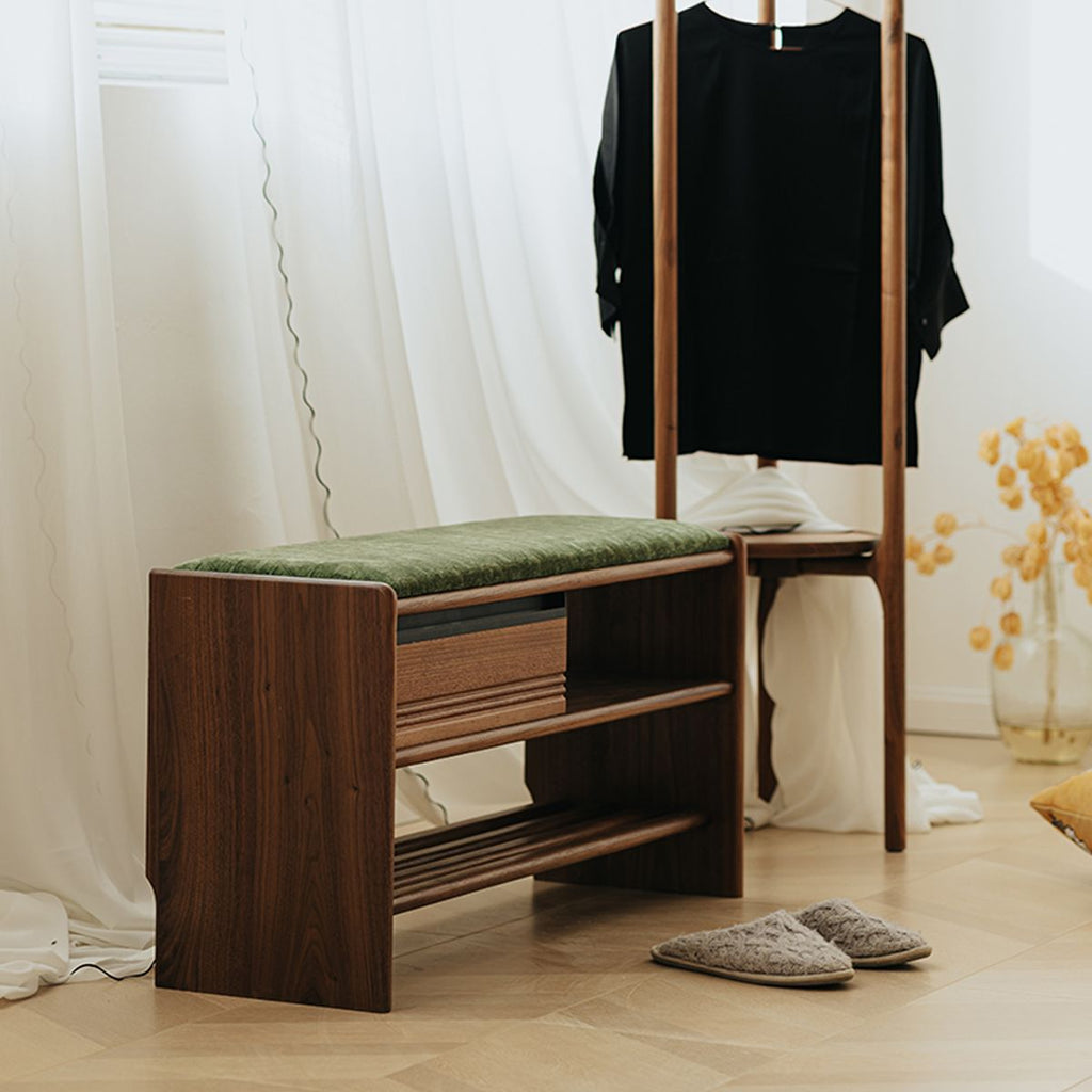 Side profile view of the compact walnut shoe bench designed for narrow hallways and small apartments with clover pattern.
