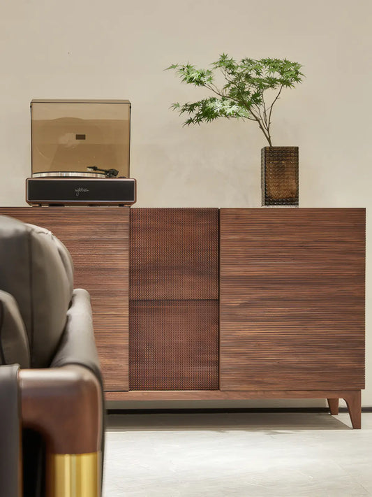 Front view of The Opus Audiophile Console in North American black walnut, featuring slatted acoustic-friendly doors and a turntable placed on top.
