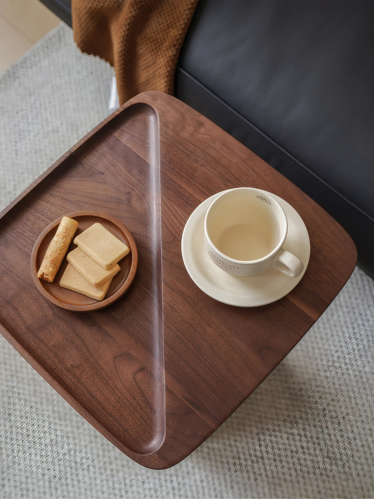 Overhead view showing the square 15x15 inch profile and exquisite joinery of the solid walnut tray top.
