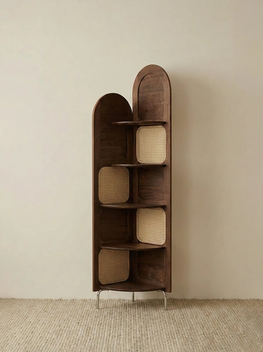 Studio isolation shot of the Heritage Series solid walnut corner shelf, showing the natural wood grain and cane webbing details without props.