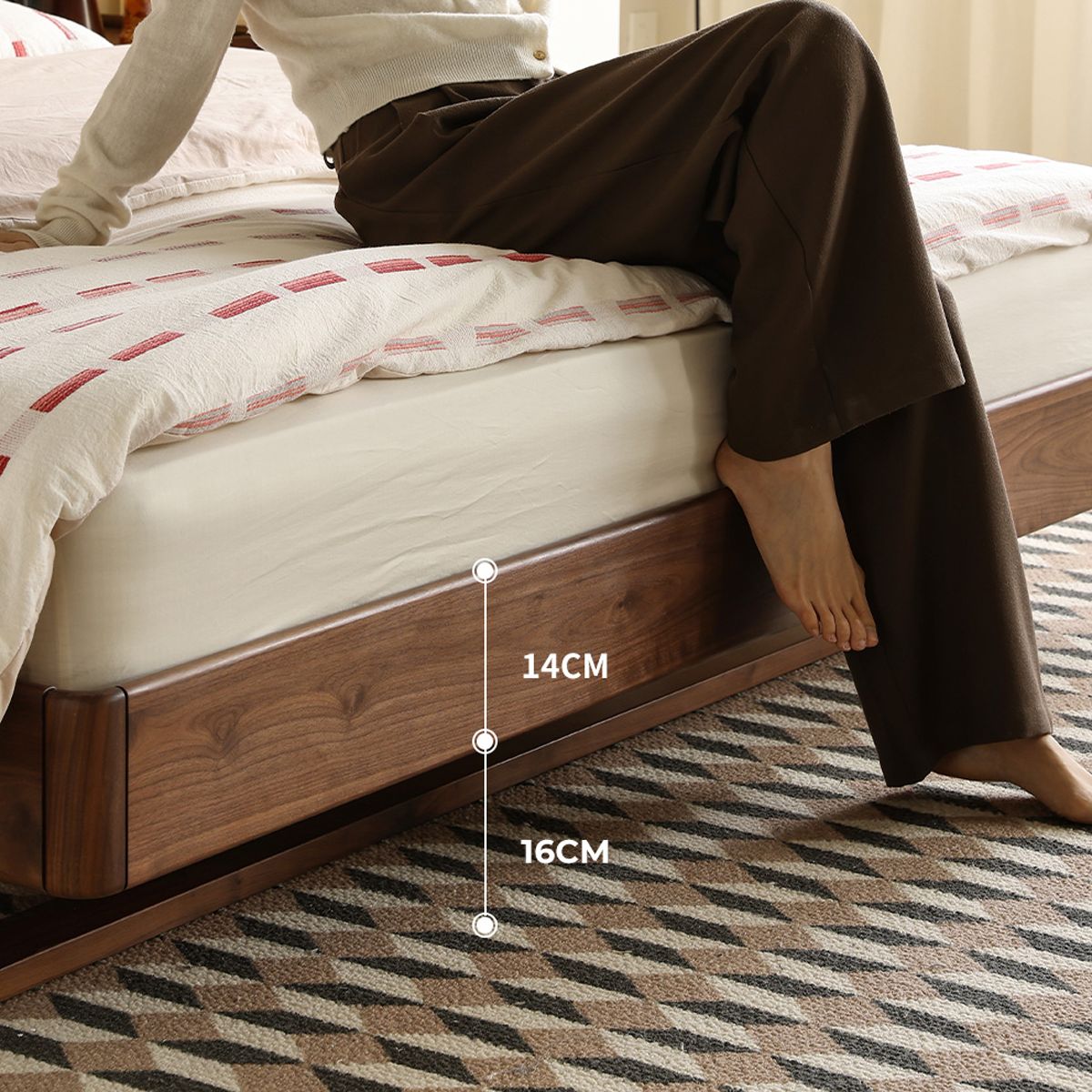Walnut floating bed base with recessed legs and mattress, modern bedroom setting