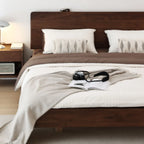 Detail of the recessed bed legs creating a floating illusion and preventing toe stubbing.