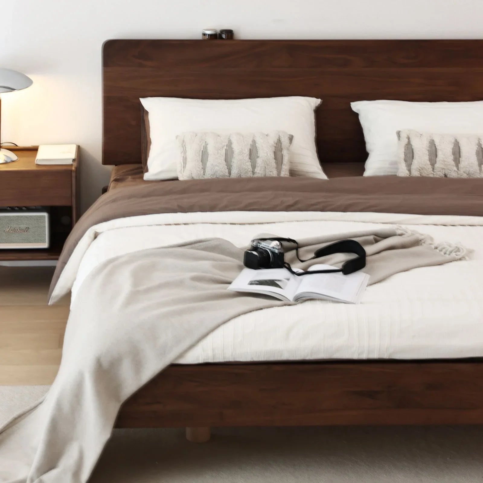 Detail of the recessed bed legs creating a floating illusion and preventing toe stubbing.