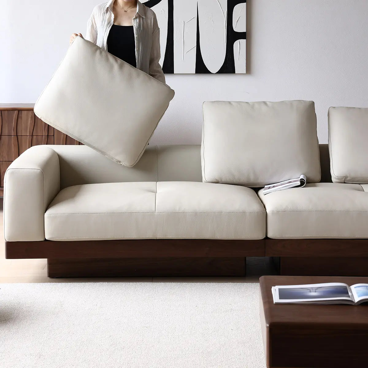 Detail shot of removable down-filled back cushion on Walnutry sofa, showcasing upholstery quality.