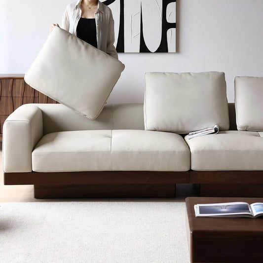 Detail shot of removable down-filled back cushion on Walnutry sofa, showcasing upholstery quality.