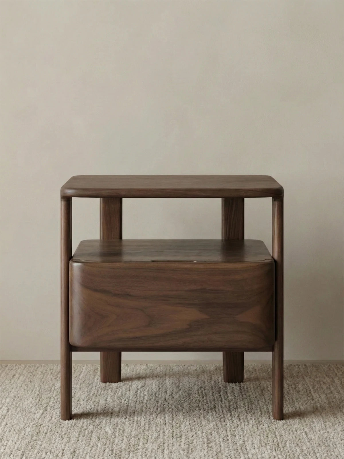Front view of Sylvan Solid North American Black Walnut Nightstand featuring mid-century modern design and tapered legs.