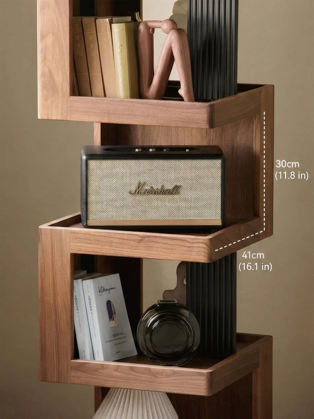 Dimension diagram showing 11.8 inch shelf height and 16.1 inch width on the solid wood spinning bookcase.