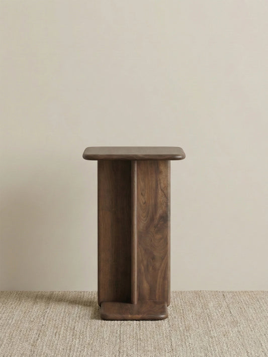 Front view of the Suiseki solid wood C-table isolated on a neutral background, highlighting the sturdy vertical support and natural wood tone.