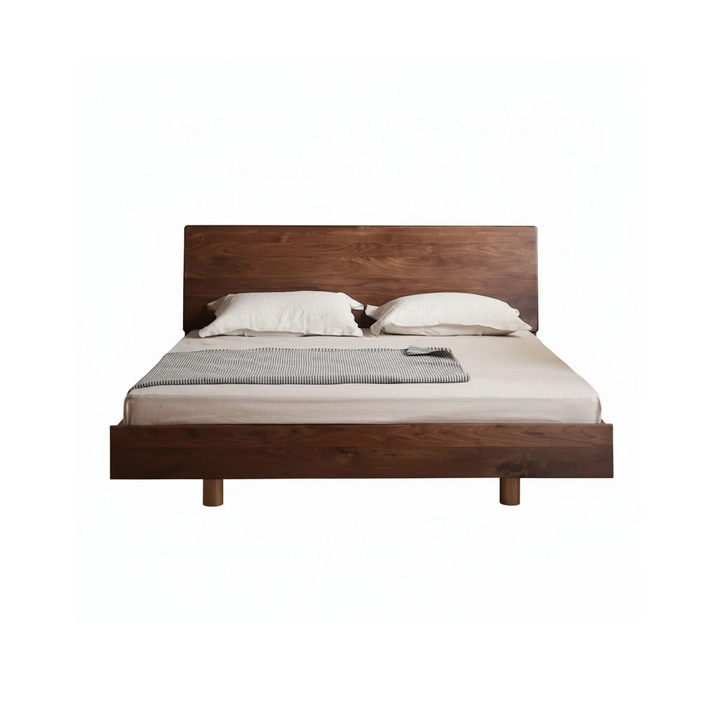 Walnutry Aero solid black walnut floating bed frame with hidden legs for a modern minimalist look.