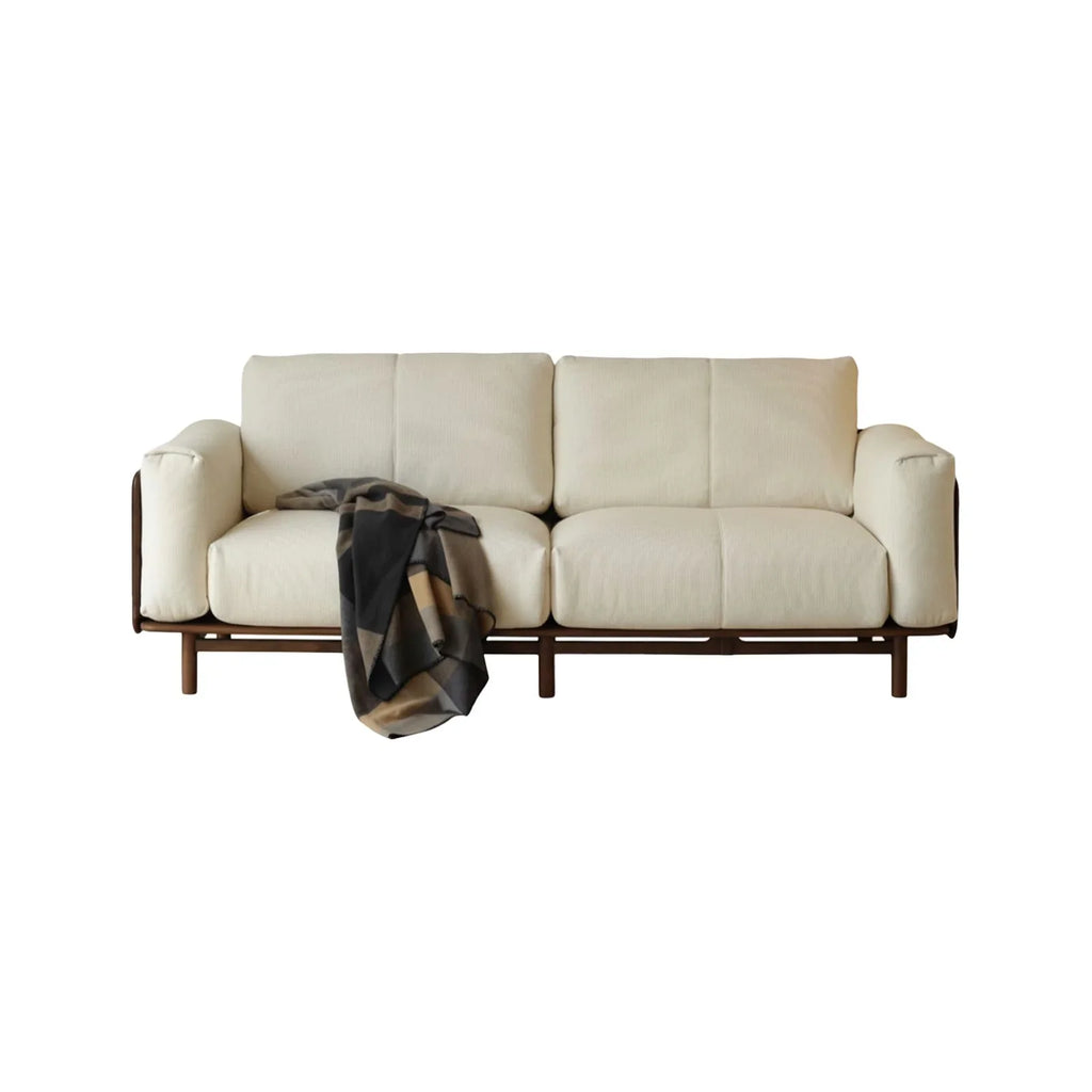 Walnutry Baxter solid black walnut sofa with beige fabric upholstery and down-filled cushions.