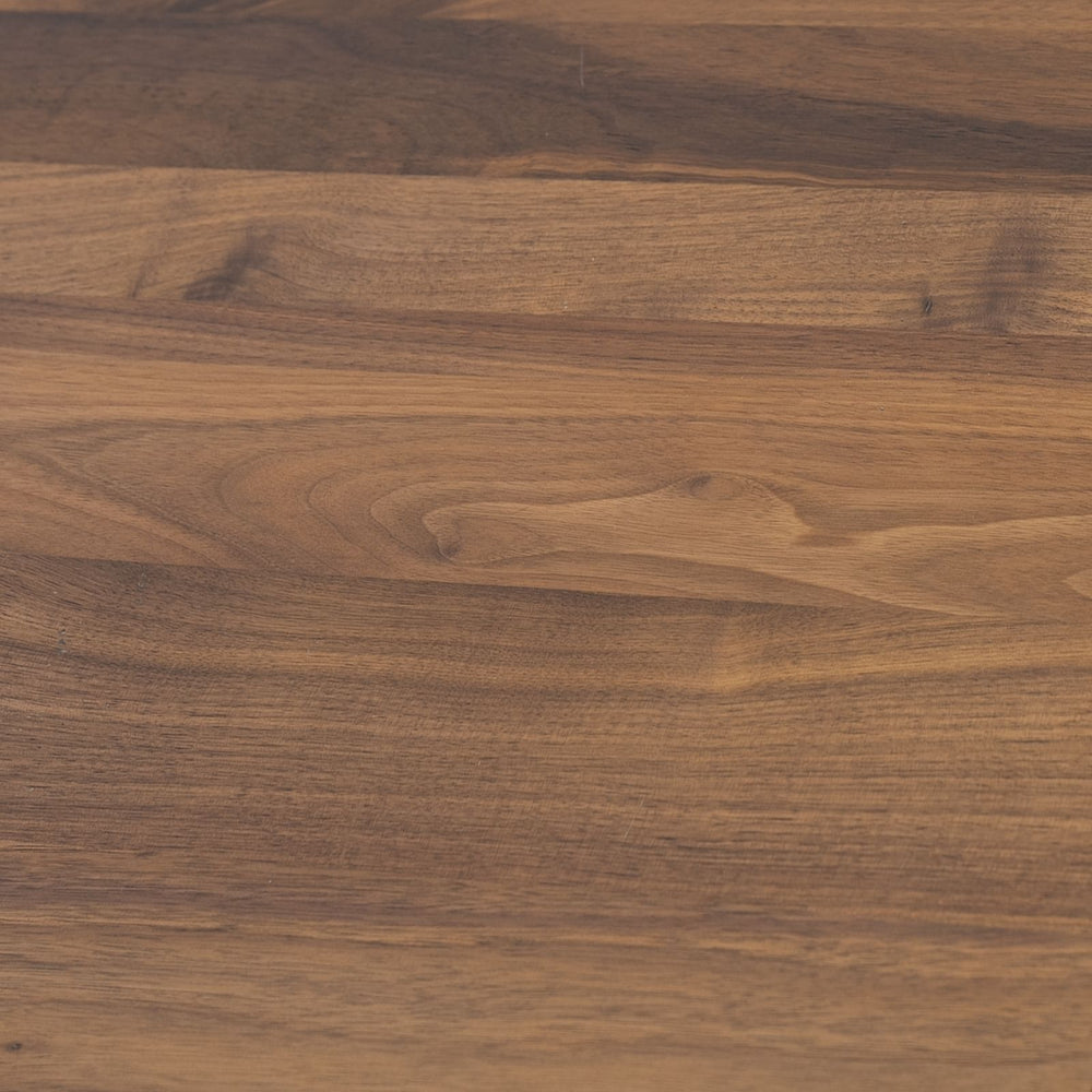 Close-up of Walnutry solid walnut table showing natural wood grain and smooth finish