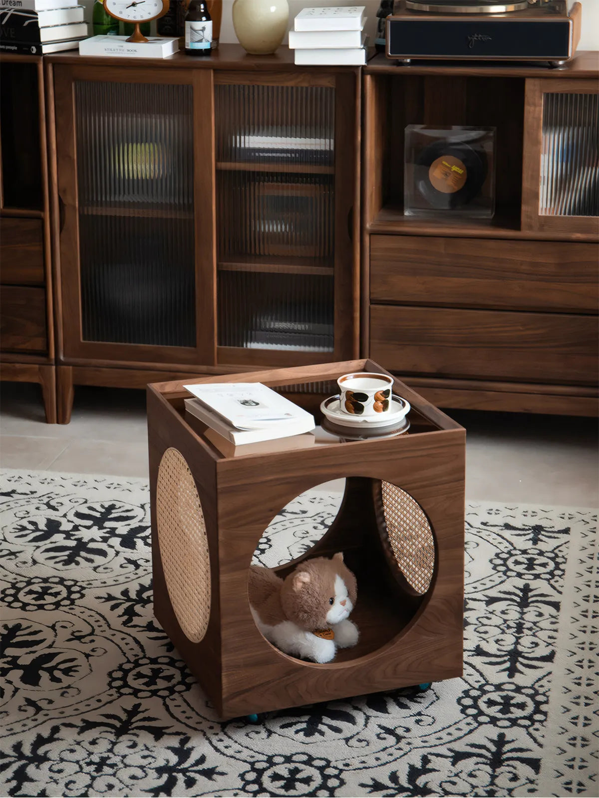 Side profile of the Sylvan cat house showing the circular entrance and rattan ventilation panel