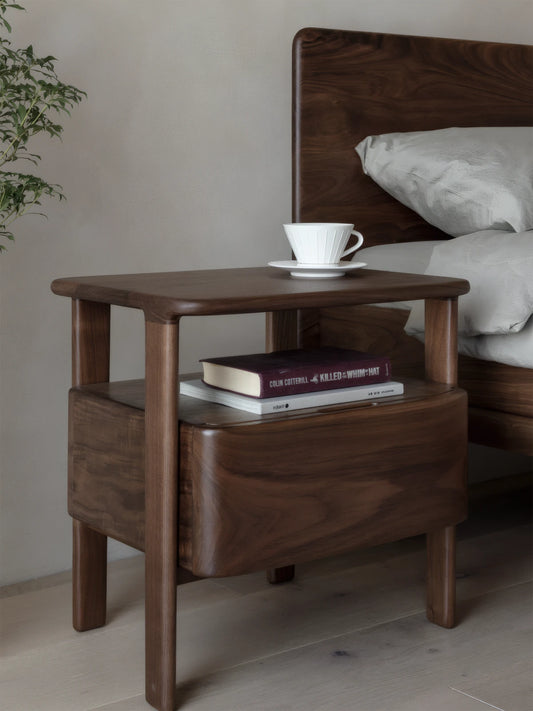 Side profile of the nightstand highlighting the deep rich chocolate tones of the solid walnut timber.