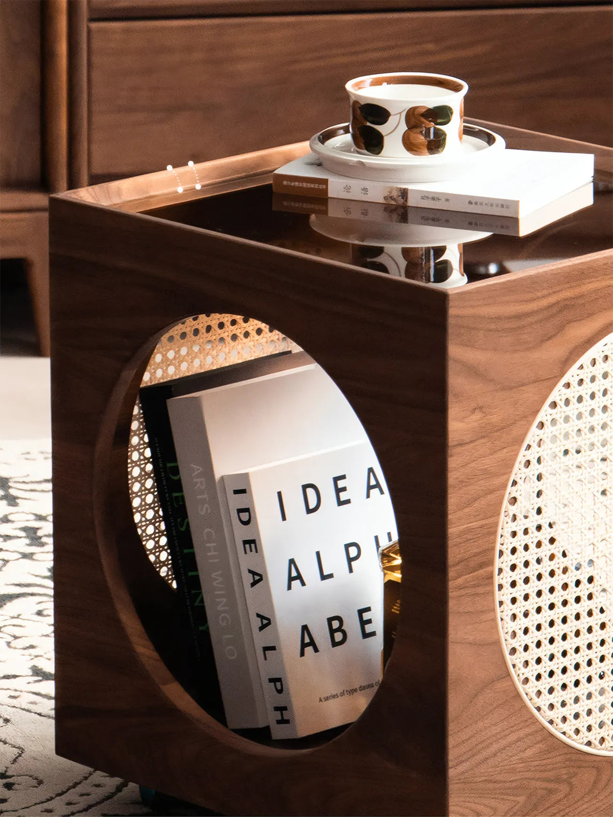 Close-up detail of shatter-resistant tempered glass top on solid wood cat furniture protecting against spills