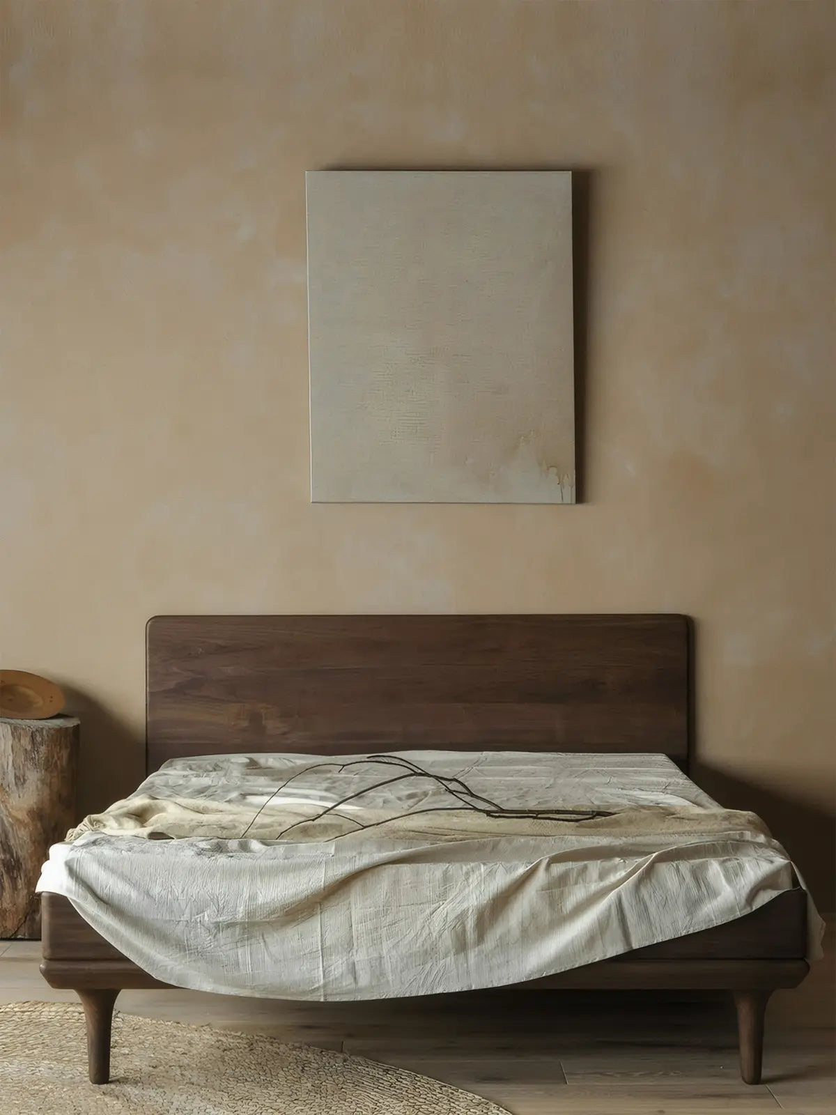 Front view of The Estate Bed Frame crafted from North American black walnut, featuring a minimalist design and neutral aesthetic.