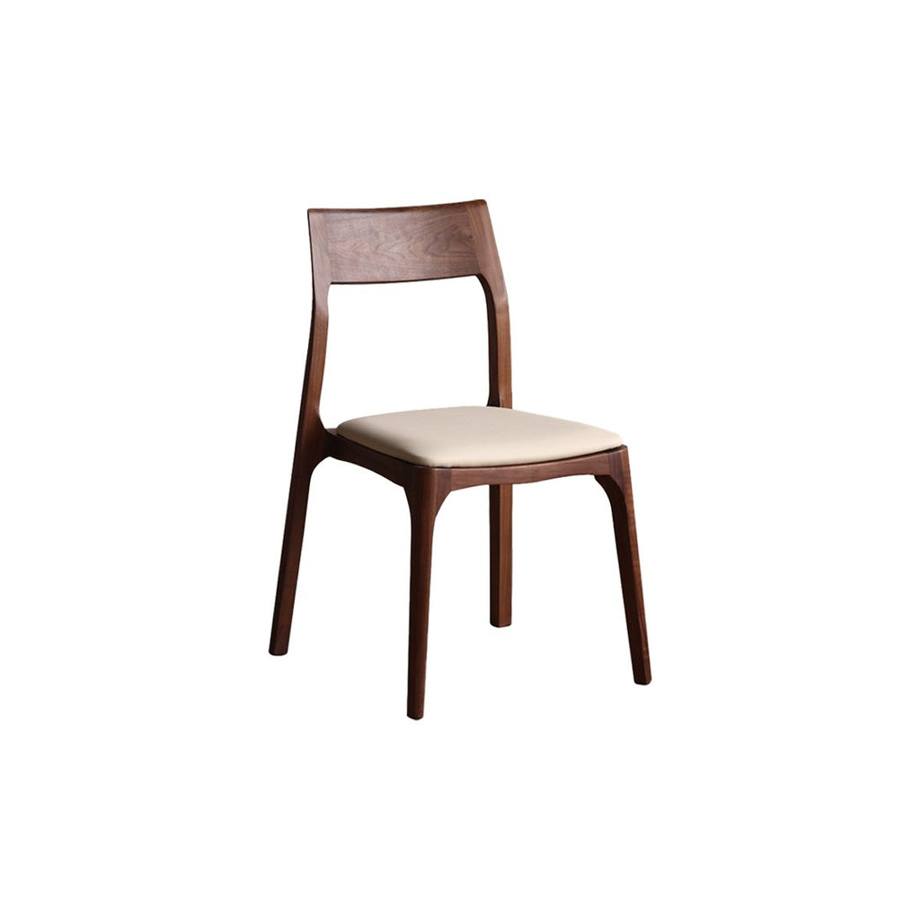 Upholstered leather dining chair with walnut wood frame and beige seat cushion