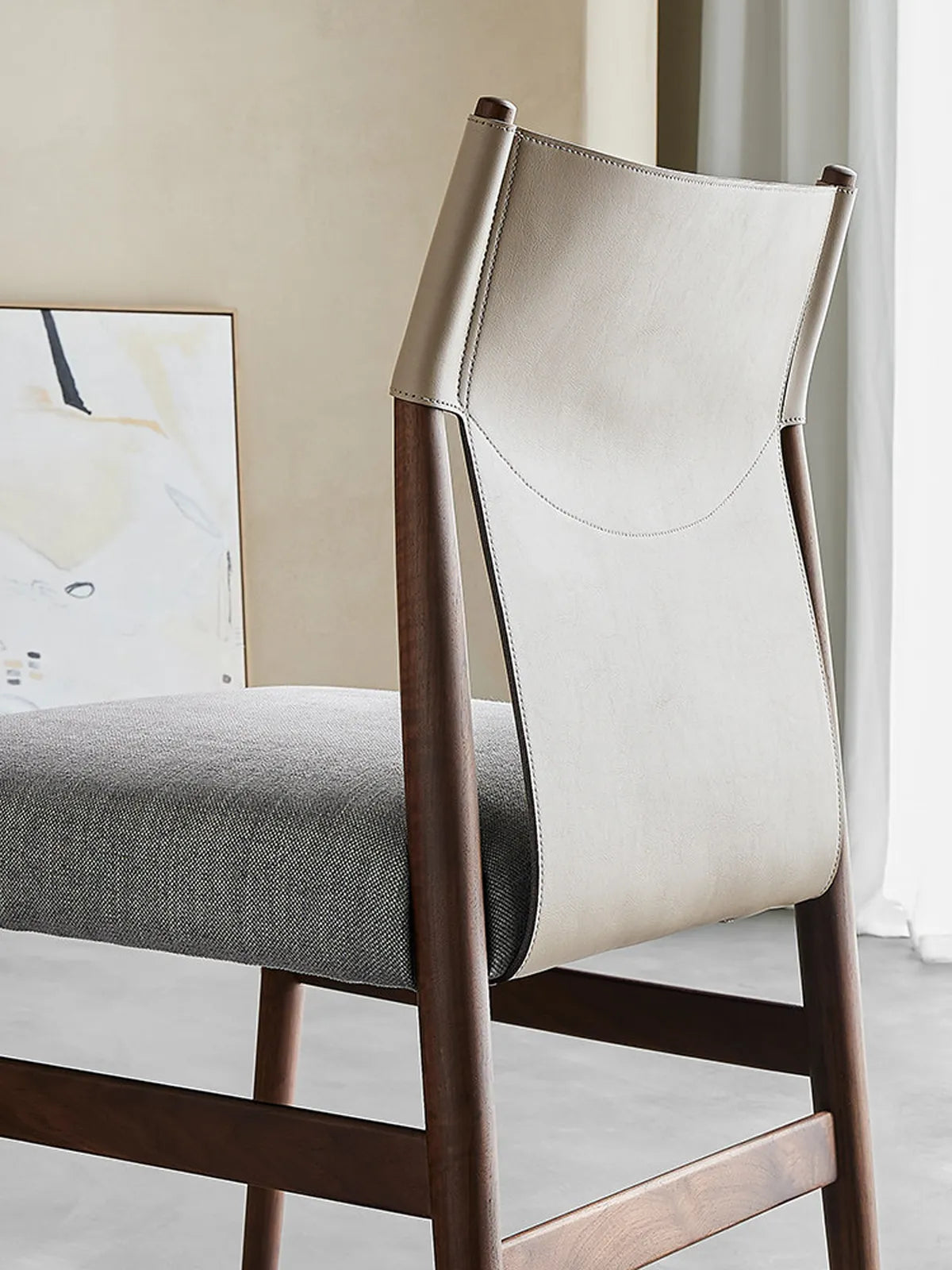 Detail shot of the premium vegan leather seat cushion with precise stitching, showcasing the high-quality upholstery of the Opus chair.