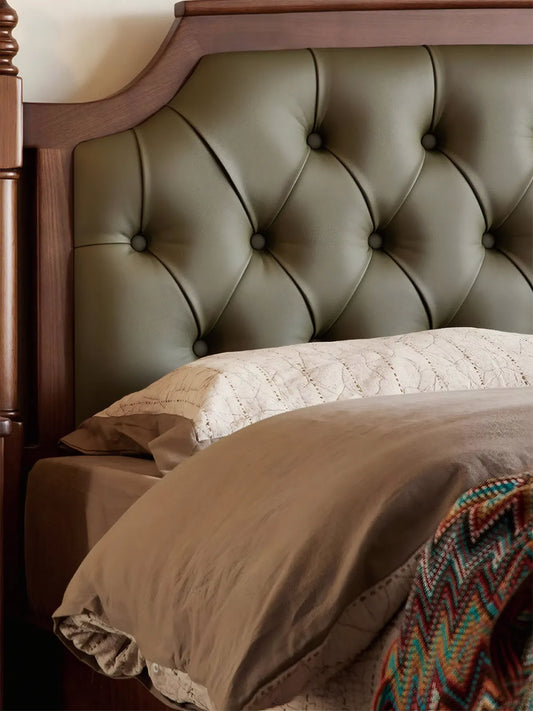 Detail of solid walnut bed post with turned leg design and decorative finial.