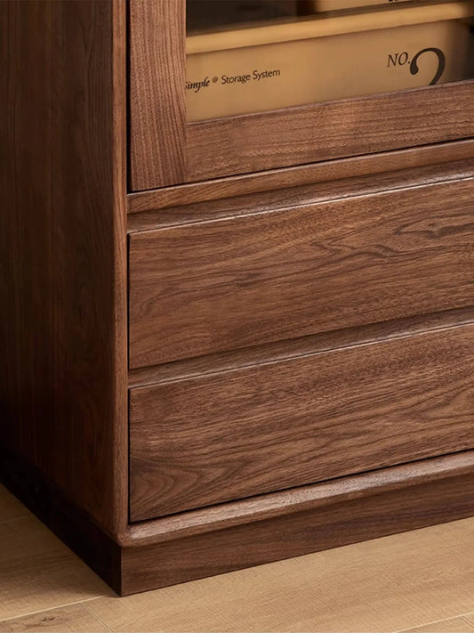 Smooth-gliding lower drawers of the Kurumi walnut cabinet featuring seamless joinery.

